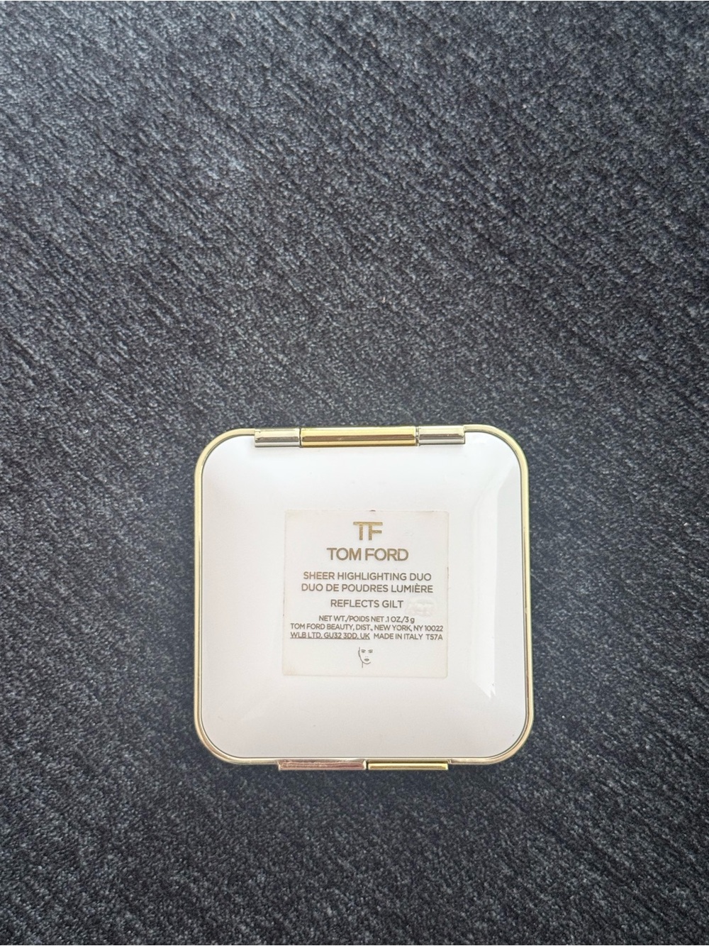 Tom Ford White and Gold Sheer Highlighting Compact reflects gilt